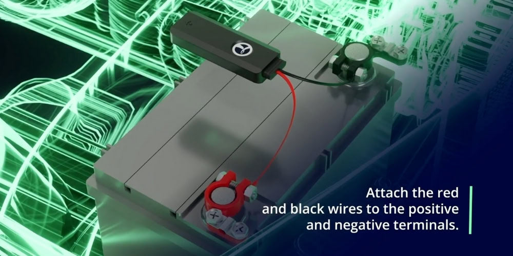 GS900 tracker attached to car battery with red and black wires to positive and negative terminals